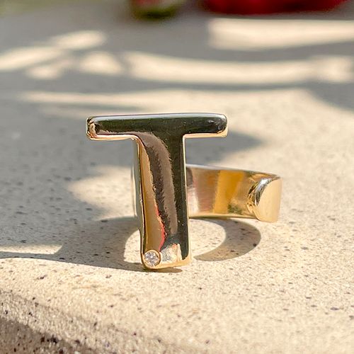 Anel zirconia branca letra t aro17 (promoção 50%)