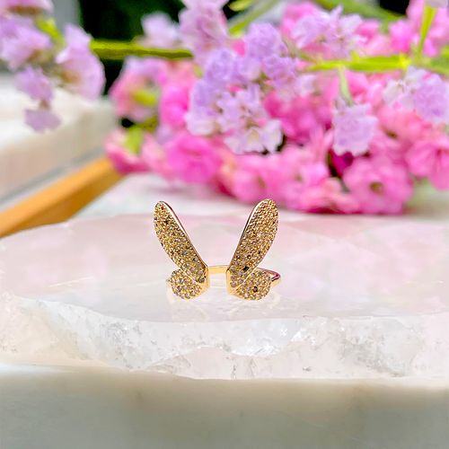 Anel zirconia colorida zirconia branca boboleta com cravação pave aberto aro 23